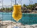 Spil Puslespil på stranden  online