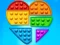 Spil Pop It Jigsaw online