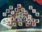 Spil Among Mahjong Tiles online